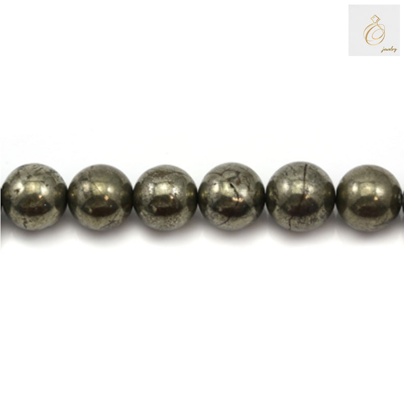 Close-up view of pyrite gemstone beads showing natural golden shine and round shape, perfect for DIY jewelry projects