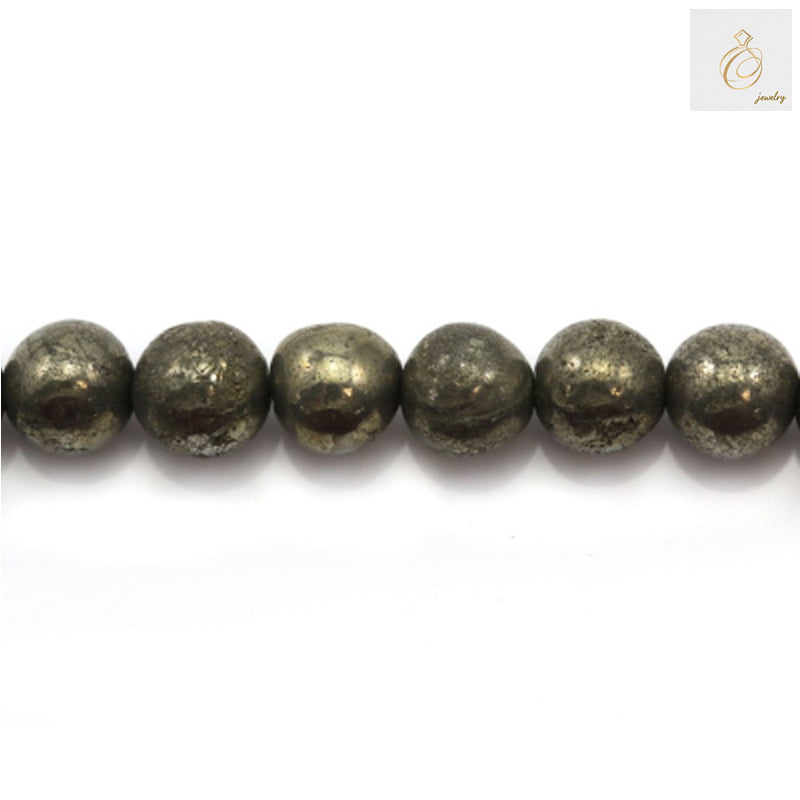 Close-up view of pyrite beads displaying the natural golden metallic shine and consistent 6mm round shape, ideal for crafting bracelets and necklaces
