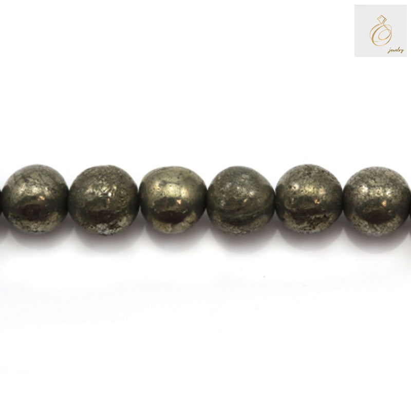 Close-up view of pyrite beads displaying the natural golden luster and metallic finish of each 8mm round bead