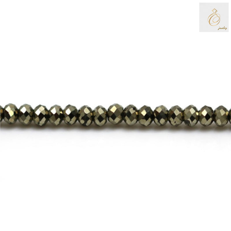Close-up of pyrite faceted abacus beads showing brilliant metallic luster and precise cut