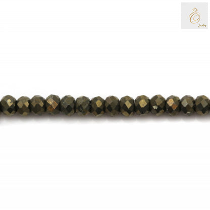 Close-up view of pyrite faceted abacus beads showing natural golden luster and consistent 1.5x2mm size