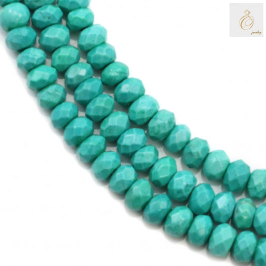 Full strand of beads displaying vibrant blue-green color and uniform sizing