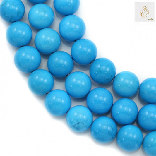 Reconstituted turquoise round beads 12mm diameter on strand - main product view showing blue-green gemstone beads for jewelry making