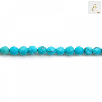 Close-up view of 4mm reconstituted turquoise faceted round beads showing blue-green color and faceted surface