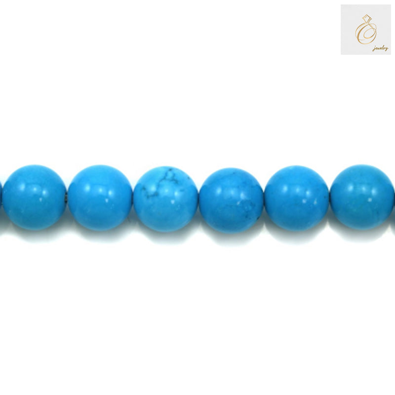 Close-up view of 12mm reconstituted turquoise round beads showing texture and color detail - jewelry making supplies