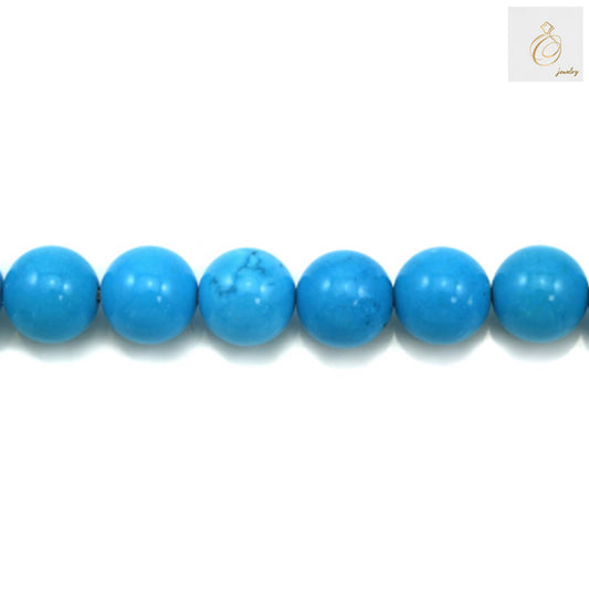 Close-up view of 12mm reconstituted turquoise round beads showing texture and color detail - jewelry making supplies