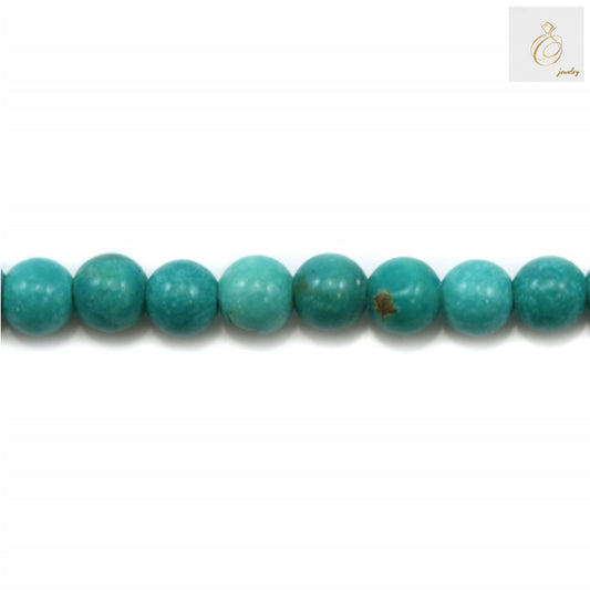 "Close-up view of 3mm turquoise round beads showing uniform size and color"
