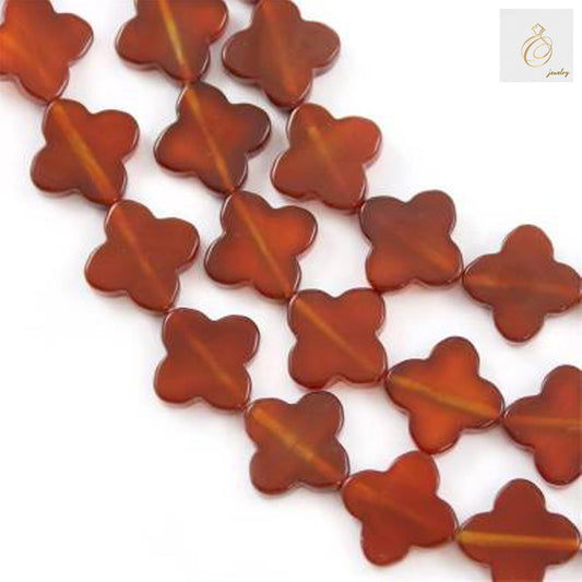 Red agate clover beads 14mm strand showing natural gemstone texture and four-leaf clover shape