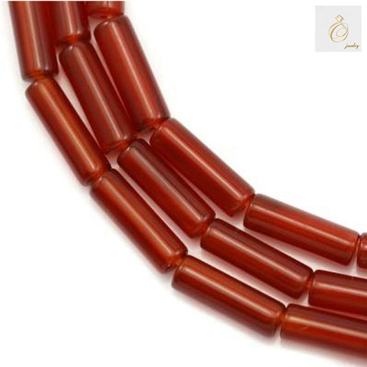 Natural red agate cylinder beads 4x13mm on 39-40cm strand, showing rich red color and smooth cylindrical shape