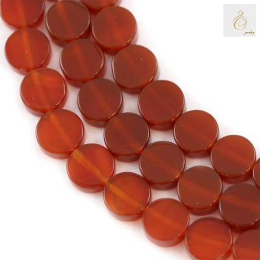 Red agate flat round beads overall view showcasing natural stone texture and rich color variations