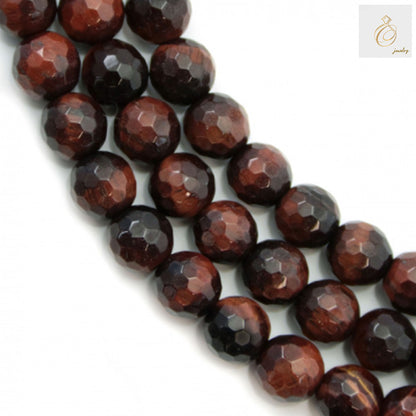 Red Tiger's Eye faceted round beads strand, 6mm diameter, showing the natural chatoyancy and rich reddish-brown color with golden highlights