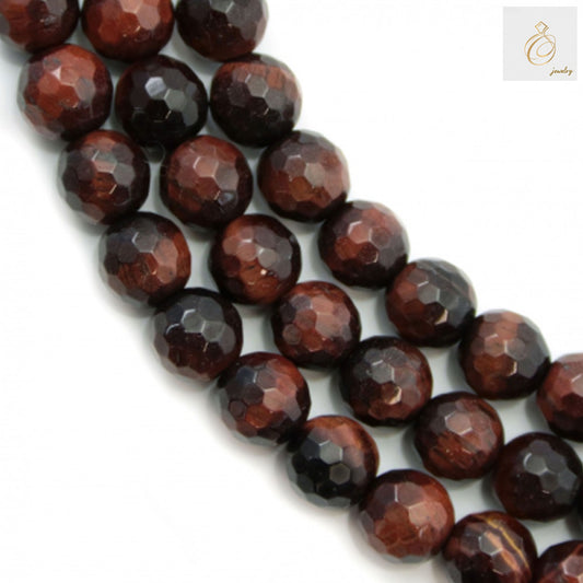 Red Tiger's Eye faceted round beads strand, 6mm diameter, showing the natural chatoyancy and rich reddish-brown color with golden highlights