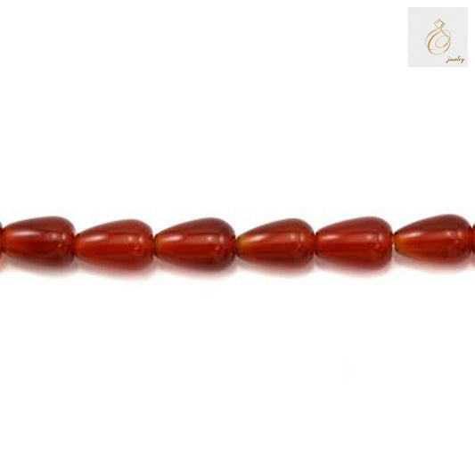 Close-up view of red agate teardrop beads 8x12mm displaying natural stone texture and teardrop shape