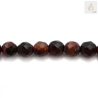 Close-up view of Red Tiger's Eye gemstone beads displaying natural chatoyancy effect and consistent 4mm round shape