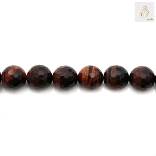 Close-up view of Red Tiger's Eye gemstone beads showing detailed faceted surface and natural stone patterns