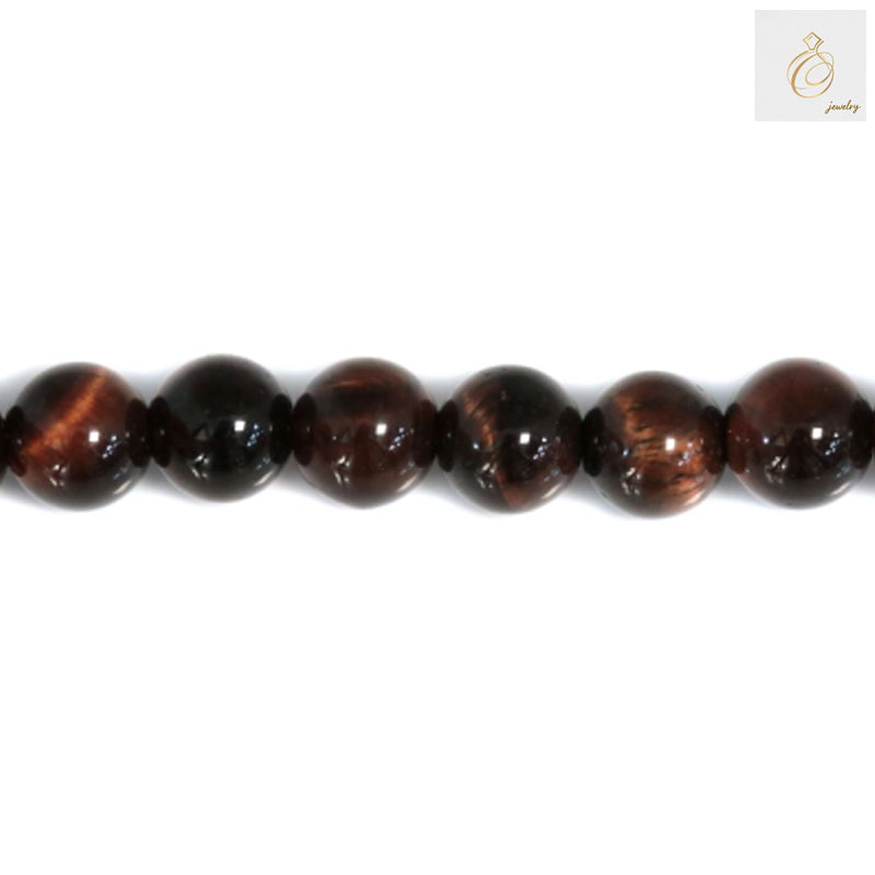 Close-up view of red tiger's eye gemstone beads 4mm with smooth round finish and natural stone variations
