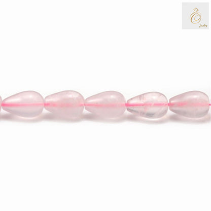 Close-up view of pink rose quartz gemstone beads in teardrop shape, 39-40cm strand length