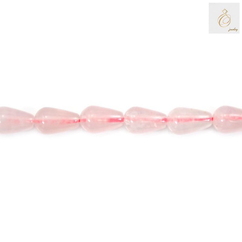 Close-up view of rose quartz teardrop beads showing pink color and quality