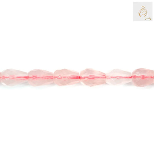 Close-up of Rose Quartz Faceted Drop Beads showing natural pink color and translucent quality