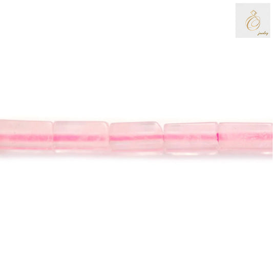 Close-up view of rose quartz rectangle gemstone beads showing pink color and uniform 2x4mm size