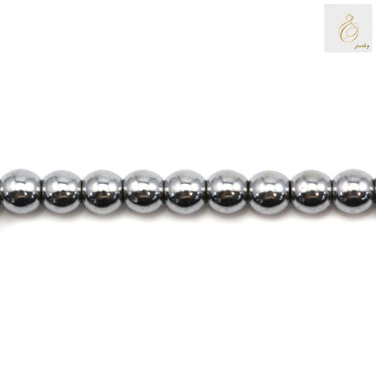 Silver hematite round beads 3mm diameter on strand - close-up view showing metallic luster and uniform size