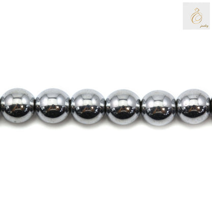 Silver hematite round beads 6mm diameter with metallic finish, displayed on strand for jewelry making