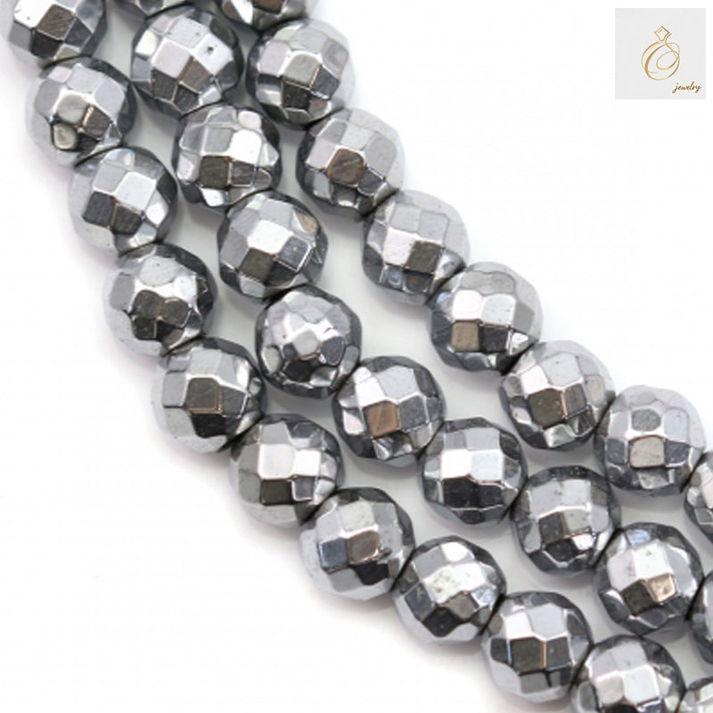 Close-up view of silver hematite faceted round beads showing detailed cut surfaces and 0.8mm holes, 39-40cm strand