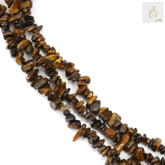 Natural Tiger's Eye chip beads on 78-80cm strand showing golden-brown chatoyancy and irregular chip shapes for jewelry making