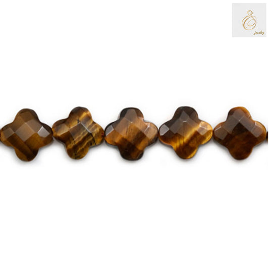 Natural tiger's eye faceted flower beads in golden brown color, 10mm size, arranged on a strand showing the characteristic chatoyant bands and reflective surface