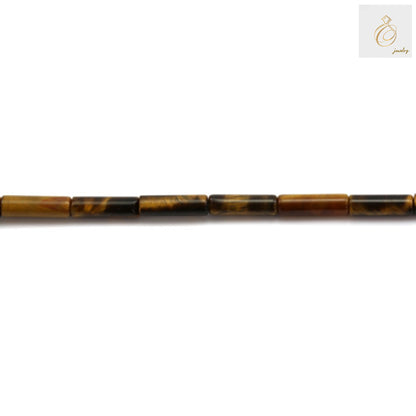 Close-up view of Tiger's Eye cylindrical gemstone beads showing natural patterns and golden bands, 4x13mm size with 0.8mm holes