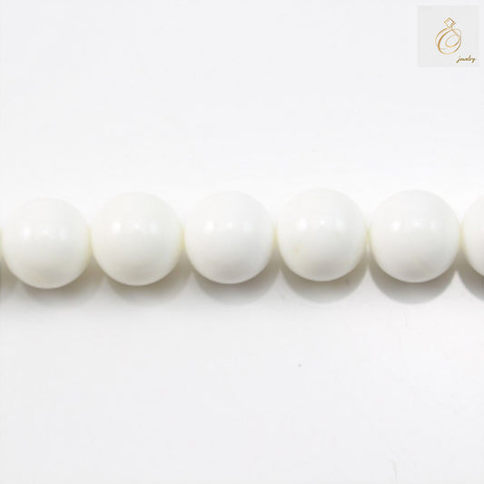 Natural Tridacna shell beads 12mm round on 39-40cm strand for jewelry making"
"Premium quality Tridacna shell beads showing natural patterns and smooth finish