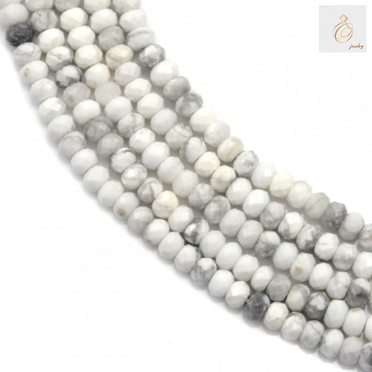 White howlite faceted abacus beads 2x3mm on strand"
"Natural white howlite gemstone beads for jewelry making