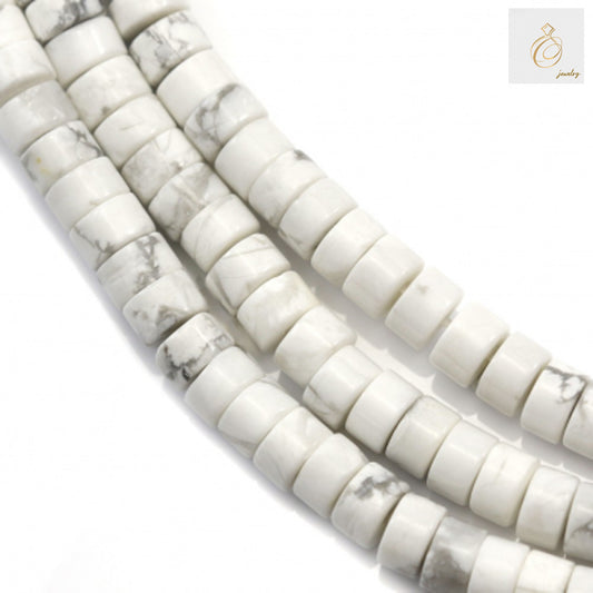 White howlite heishi beads 2x4mm arranged on strand for jewelry making"
"Natural white howlite flat disc beads with gray veining, 39-40cm strand