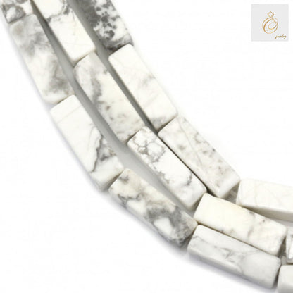White howlite rectangle beads 4x13mm on 39-40cm strand for jewelry makingClose-up view of white howlite rectangle beads showing 4x13mm size and smooth finish