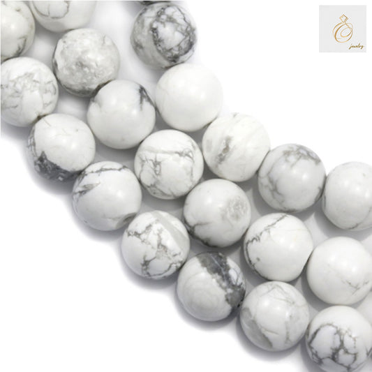 White howlite round beads 10mm diameter on 39cm strand for jewelry making"
"Natural white howlite gemstone beads with smooth round finish"
"Premium white howlite beads strand showing individual 10mm round beads