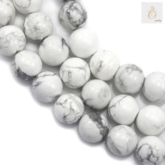 White howlite round beads 12mm diameter on 39cm strand for jewelry making"
"Natural white howlite gemstone beads with smooth polished finish