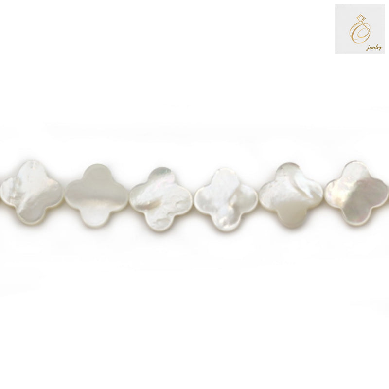 White mother-of-pearl clover beads 13mm diameter with natural iridescent finish, arranged on strand showing four-leaf clover shape and lustrous surface quality