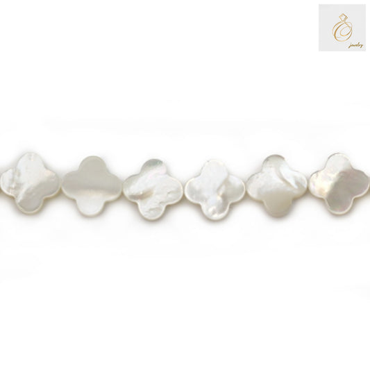 White mother-of-pearl clover beads 13mm diameter with natural iridescent finish, arranged on strand showing four-leaf clover shape and lustrous surface quality