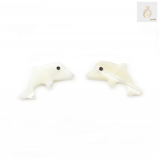 White mother-of-pearl dolphin shaped beads 7x15mm arranged on strand showing size and hole detail