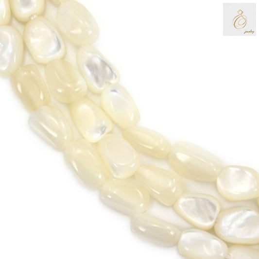 Close-up view of white mother-of-pearl baroque nugget beads showing natural luster and texture