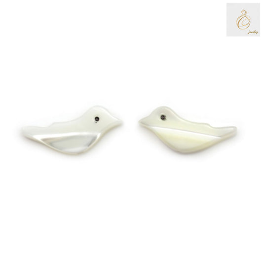 Close-up view of white mother of pearl bird beads showing natural iridescent surface and 6x15mm size