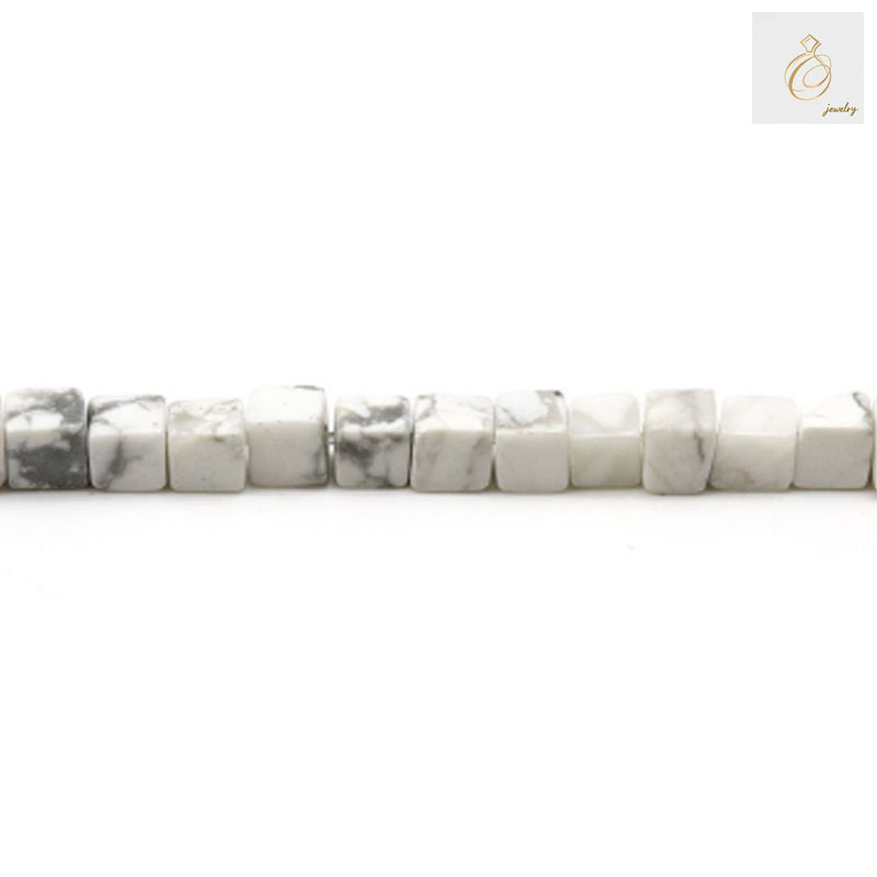 4mm white stone cube beads strand for crafting"
"White howlite geometric beads with uniform cube shape