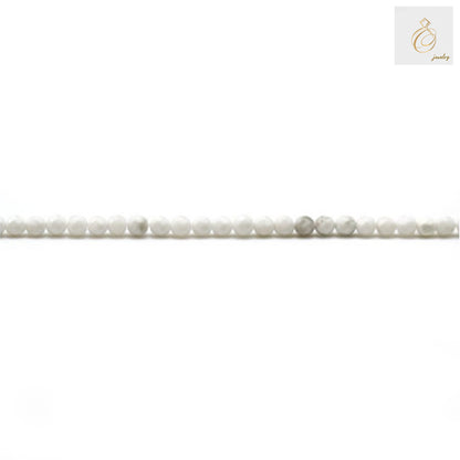 Premium white howlite beads strand showing consistent 2mm round faceted gems