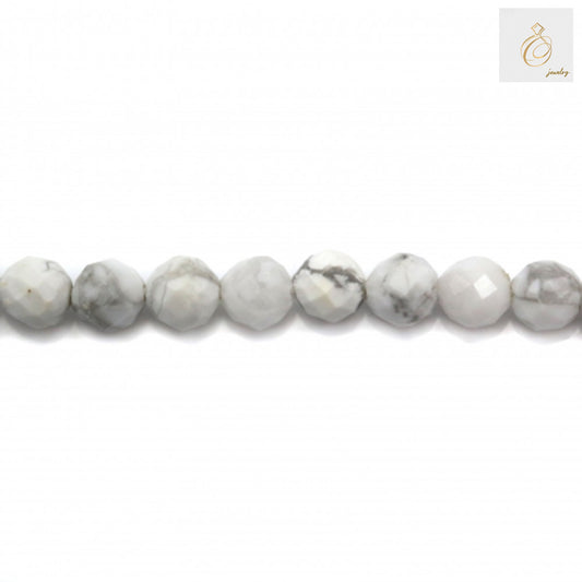 Close-up of 3mm white howlite faceted round beads showing texture and quality