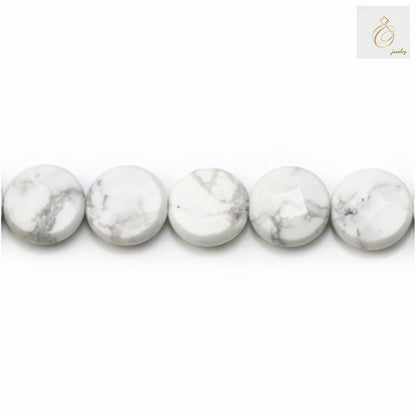 Close-up view of white howlite beads showing faceted surface and 1mm holes"