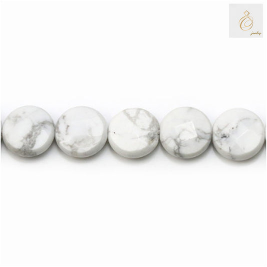 Close-up view of white howlite beads showing faceted surface and 1mm holes"