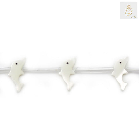 White mother-of-pearl dolphin beads 7x15mm displayed on white background showing natural iridescent shell finish