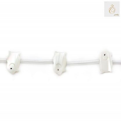 White mother-of-pearl shell beads in pig shape, 8x14mm size, showing lustrous white finish and smooth texture