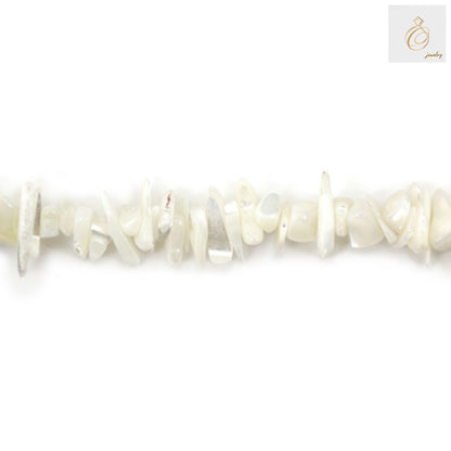 White mother of pearl chip beads close-up view showing natural lustrous finish and irregular chip shapes