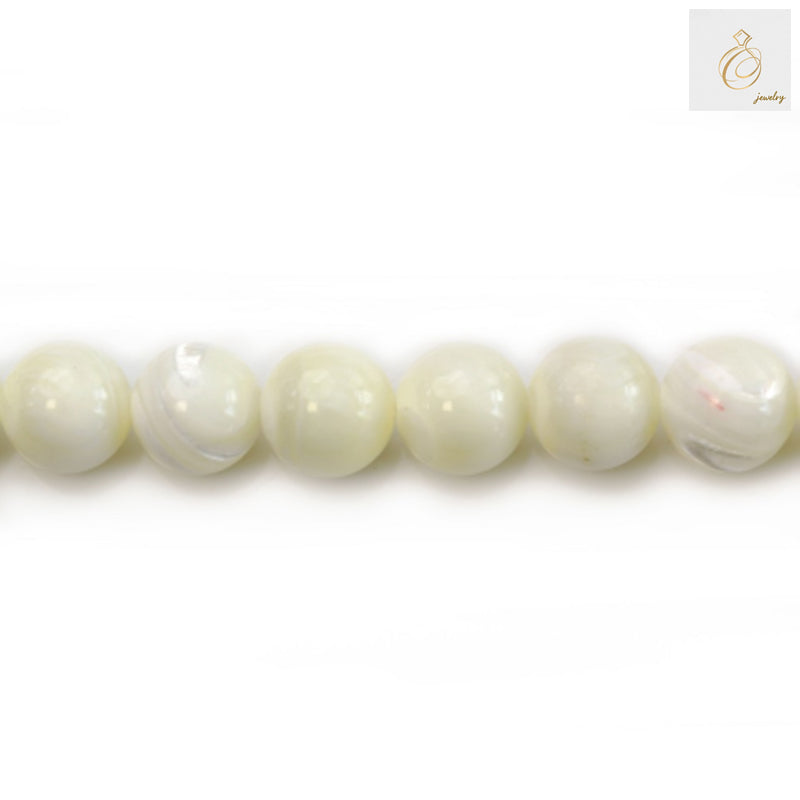 White mother of pearl round beads strand 10mm diameter showing lustrous finish and natural variations